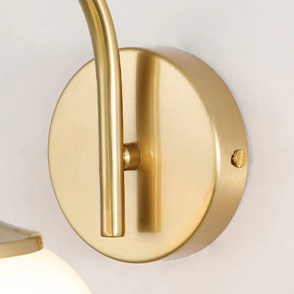 Teal | Glass Globe Wall Sconce with Polished Brass Arm